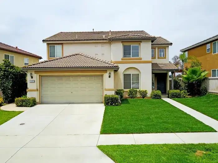 Two-story family home with drone and interior photos, photo 1