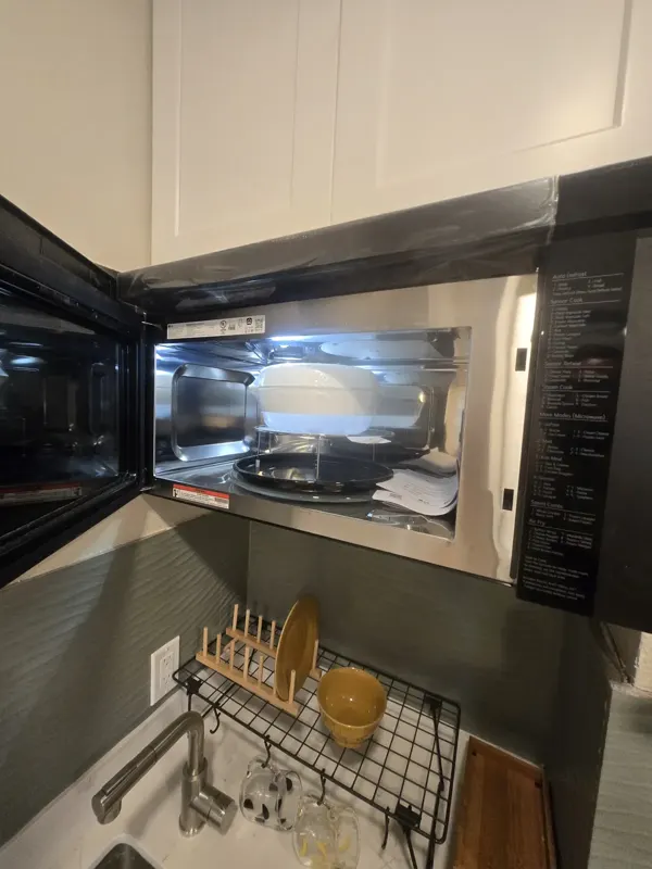 Clean the range hood filter and dryer lint path