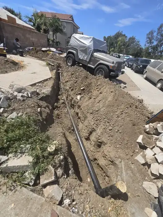 Trench with new pipe