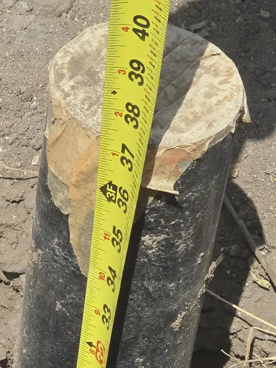 Old pipe exposed in the trench