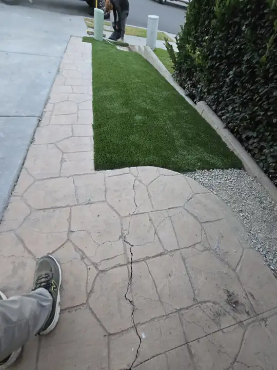 Turf with stamped concrete walk